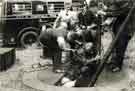 View: u11201 City of Sheffield Fire Brigade. Superintendant T. Breaks descends into sewer looking for 2 children who were later found drowned