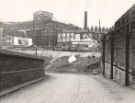 View: u11389 Construction of Sheaf Square roundabout showing (top left) Arthur Davy and Sons Ltd, bakers and provision merchants, Paternoster Row and (top centre) the Midland Restaurant (No.6)