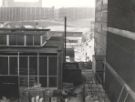 View: u11413 View from Arundel Gate of the Engineering and Building Laboratories, Sheffield Polytechnic showing (centre) Sheaf Valley Baths and (back) Park Hill and Hyde Park Flats