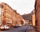 View: u11451 Arundel Street looking towards Howard Street showing (centre) Owen Building, Sheffield Polytechnic and (left) former buildings of Cooper Brothers and Sons Ltd., Don Plate Works