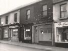 View: u11464 Nos. 98 - 104 Staniforth Road showing No. 100 J. L. Television and No. 102 William Marsden, butchers