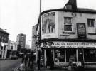 View: u11518 DIY shop on London Road at the junction with John Street showing (left) No. 126 Tramway Hotel