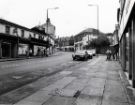 View: u11539 London Road showing (centre) Nos. 140 - 144 Beltons, kitchen furniture dealers