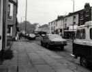 View: u11540 London Road showing (centre) Nos. 53 - 67 T. C. Harrison, car dealers; No. 81 J. Minott, jewellers and (right) No.83 Sewing Machine Centre, sewing machine agents and dealers