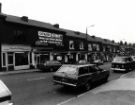 View: u11547 Nos. 319 - 355 London Road showing (centre) Nos. 319 - 333 Cowen Barrett Ltd., plumbers merchants and kitchen shop