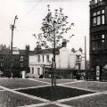 View: u11663 Townhead Street and Church Street. No. 8 Townhead Street, Brightside and Carbrook Co-op Society, Opticians, No 56, Church Street, St. James' Chambers