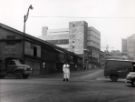 View: u11675 Broad Street, showing (left) Dutfield and Sherringham, fruit and potato merchants, Castlefolds wholesale market showing (centre) the rear of F. W. Woolworth building