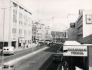 View: u11723 View of Arundel Gate looking towards Castle Square showing (left) J. Walsh and Co., department store and (right) Woodcock Travel Ltd., travel agents and YEB offices