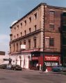 View: u11781 Derelict Lyceum Theatre and Lyceum Jewellers, corner of (left) Tudor Street and (right) Tudor Place