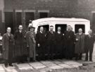 View: u11931 Group with St. John's ambulance vehicle