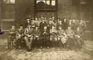 Visit of (5th left sitting) Rt. Hon. Winston Churchill MP [Minister of Munitions] to Hadfields Ltd., East Hecla Works, Tinsley, Sheffield