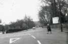 Oakbrook Road at junction with (left) Rustlings Road also showing entrance to Whiteley Woods