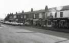 Shops on Firth Park Road (now Owler Lane) at junction with (left) Barnsley Road showing (l. to r.) No. 28 J. and A. Robinson, stationers and No. 26 Crinoline, gowns 