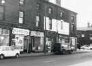 Shops on London Road showing (l. to r.) No. 635 W. Phillips and Son, pork butchers, No. 637 Split Fixings Ltd., engineers, No. 639 Hair by Kathleen, ladies hairdressers, No. 641 Eric's, pet supplies and No.643 Benhaven Motor Co., car dealers