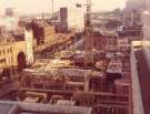 Construction of new Law Courts, Snig Hill showing (left) Whitbread Exchange Brewery, Bridge Street and Hancock and Lant Ltd., furniture dealers, Blonk Street and (top right) Hyde Park Flats