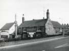 Market Street, Woodhouse showing (l.to r.) No. 16 Harrison and Kemshall, butchers, No.14 Cross Daggers Restaurant and (foreground) Woodhouse Market Cross