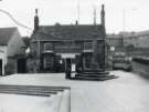 Cross Daggers Restaurant, No. 14 Market Street, Woodhouse and (foreground) Woodhouse Market Cross