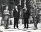 Sir John Osborn (1922 - 2015) MP (second left) with visitors from West Germany at the Houses of Parliament, London