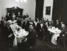 Sir John Osborn (1922 - 2015) MP (first left standing) at unidentified dinner