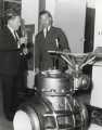 Sir John Osborn (1922 - 2015) MP (right): probably visiting the Chemical and Petroleum Engineering Exhibition, Olympia, London