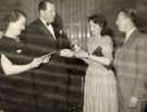 Mr and Mrs [G.] Wilton Lee (1st and 2nd left) presenting 1st lady and 1st gentleman whist prizes, (Lee of Sheffield Ltd.) Arthur Lee and Sons Ltd., steel manufacturers