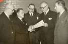 Presentation of a certificate by the National Savings Committee to (Lee of Sheffield Ltd.) Arthur Lee and Sons Ltd., steel manufacturers, Trubrite Works, Meadowhall