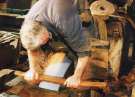 Ron Stanley, scythe grinder, Abbeydale Industrial Hamlet Museum, formerly Abbeydale Works, premises of W. Tyzack, Sons and Turner Ltd., manufacturers of files, saws, scythes etc., c.1994