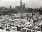 View: u13747 Construction of Sheffield City Hall, Barkers Pool showing (top centre) Co-operative Wholesale Society Ltd., jeans and overall manufacturers, Nos. 70 - 82 West Street