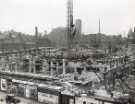 Construction of Sheffield City Hall, Barkers Pool showing (top centre) Co-operative Wholesale Society Ltd., jeans and overall manufacturers, Nos. 70 - 82 West Street and (right) Balm Green