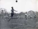 Hallam FC right back clears his lines during the Amateur League semi final against Hallam FC at the Waterworks ground, Crookes (Hadfields sports ground), [c. 1950]