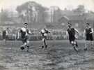 Sheffield Rovers FC., T. Sergeant breaks through closely followed by G. Watson and watched by 3 Hallam FC defenders during the Amateur League semi final at the Waterworks ground, Crookes (Hadfields sports ground), [c. 1950]